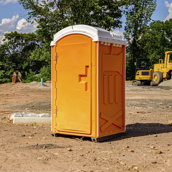 what is the cost difference between standard and deluxe portable restroom rentals in Viola